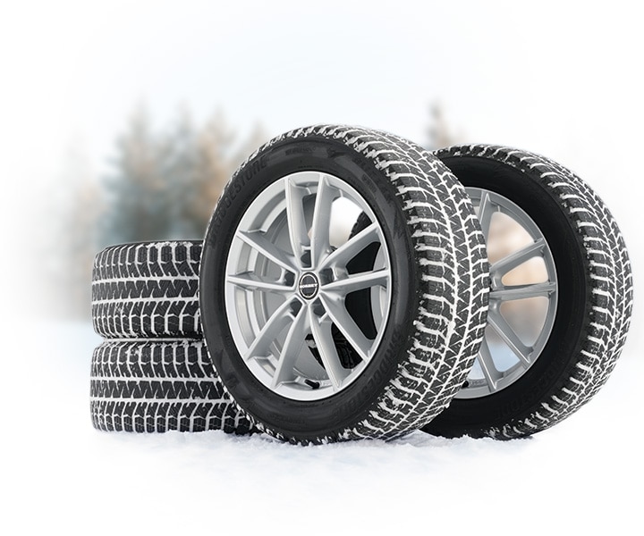 The Perfect Plan for Winter Group of Tires with Snow Packed in the Tread