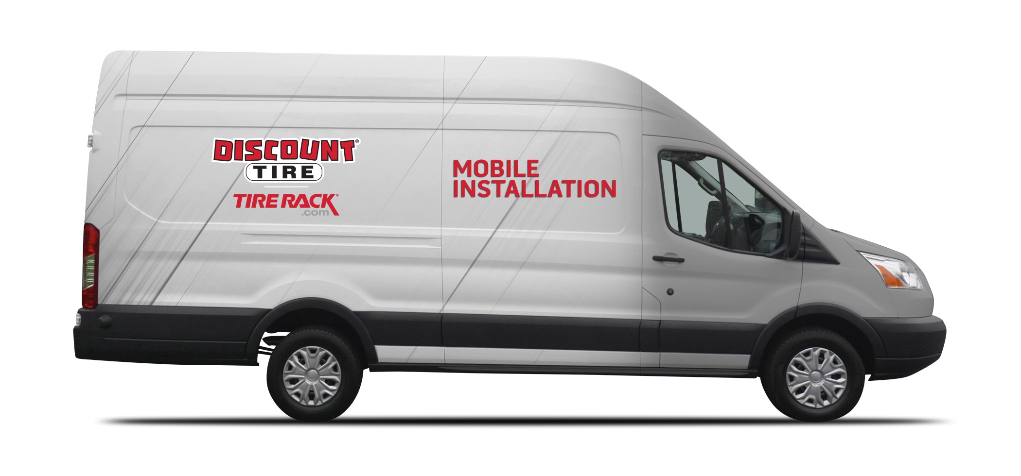 White van with the logos for Discount Tire and Tire Rack, as well as text reading 'Mobile Installation'