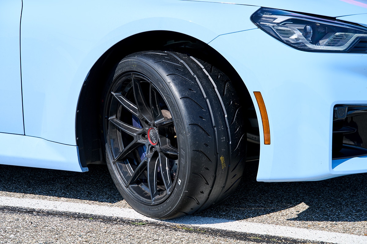 Falken Azenis RT660 tires on a light blue 2024 BMW M2